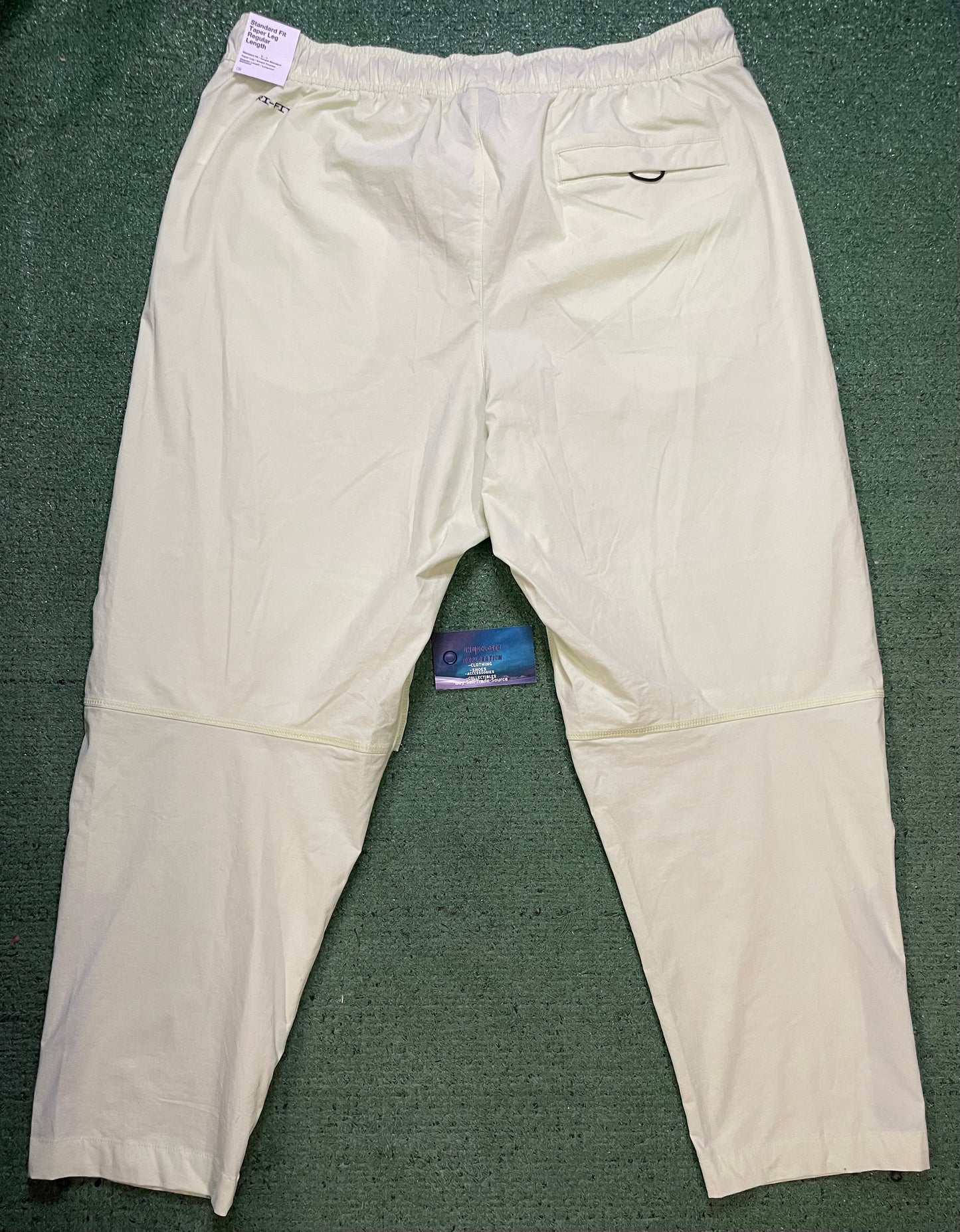 Nike tech woven lime pants