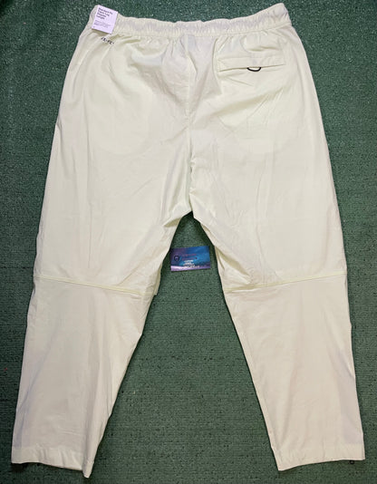 Nike tech woven lime pants