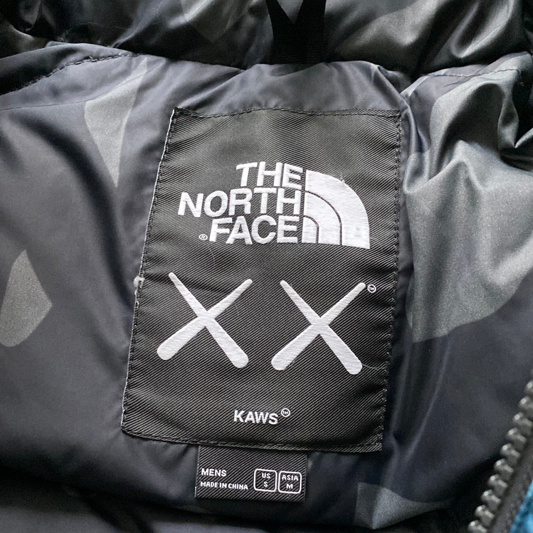 The North Face X KAWS 1996 Retro Nupste Puffer Jacket