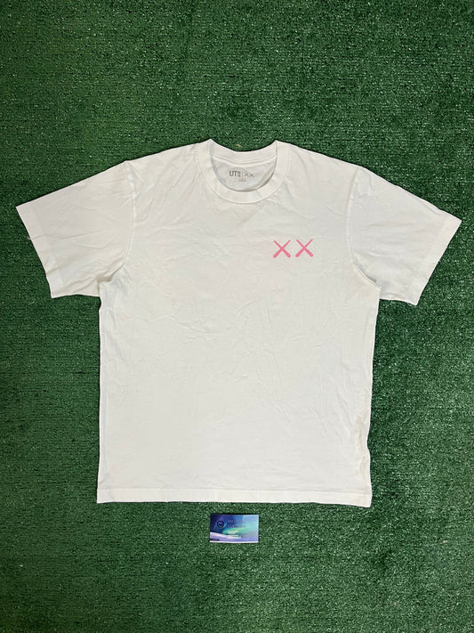 Kaws x Uniqlo pink companion tee