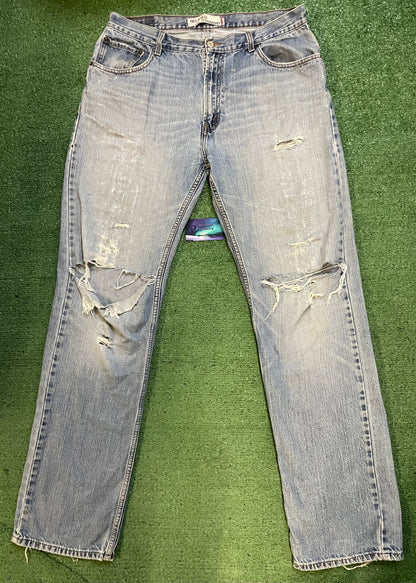 Levi 559 light wash distressed denim jeans