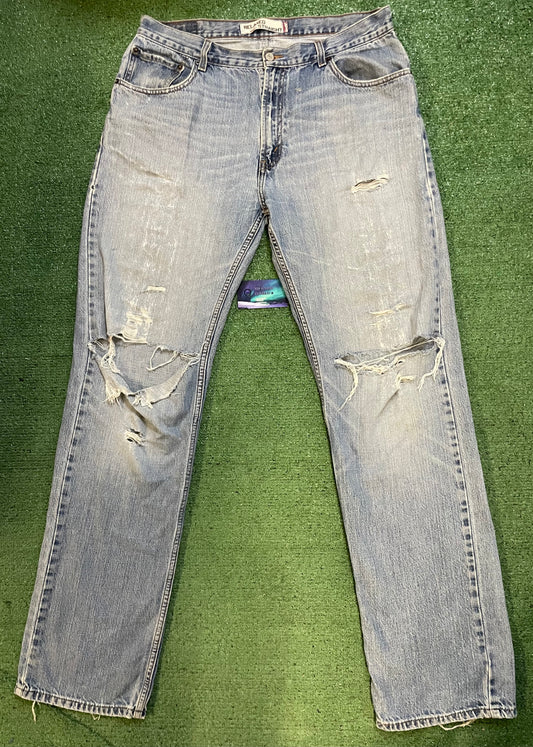 Levi 559 light wash distressed denim jeans