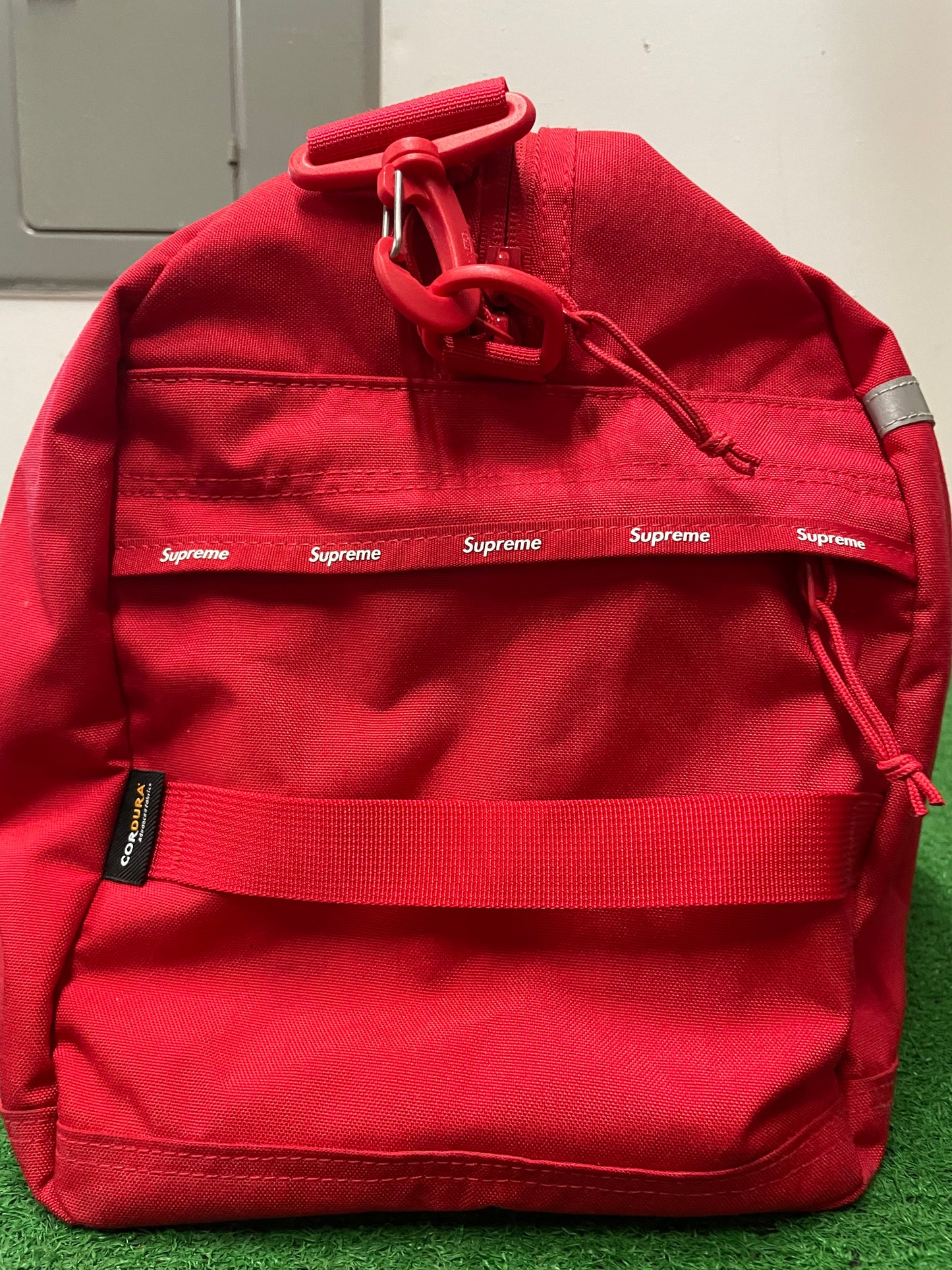Supreme red duffle bag FW24