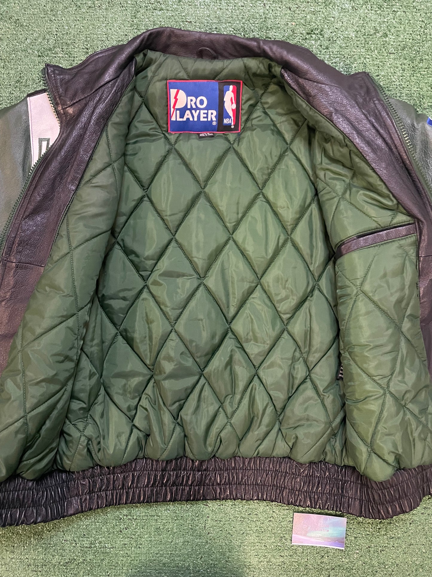 Vintage 1990s Seattle Sonics pro player Sonics jacket
