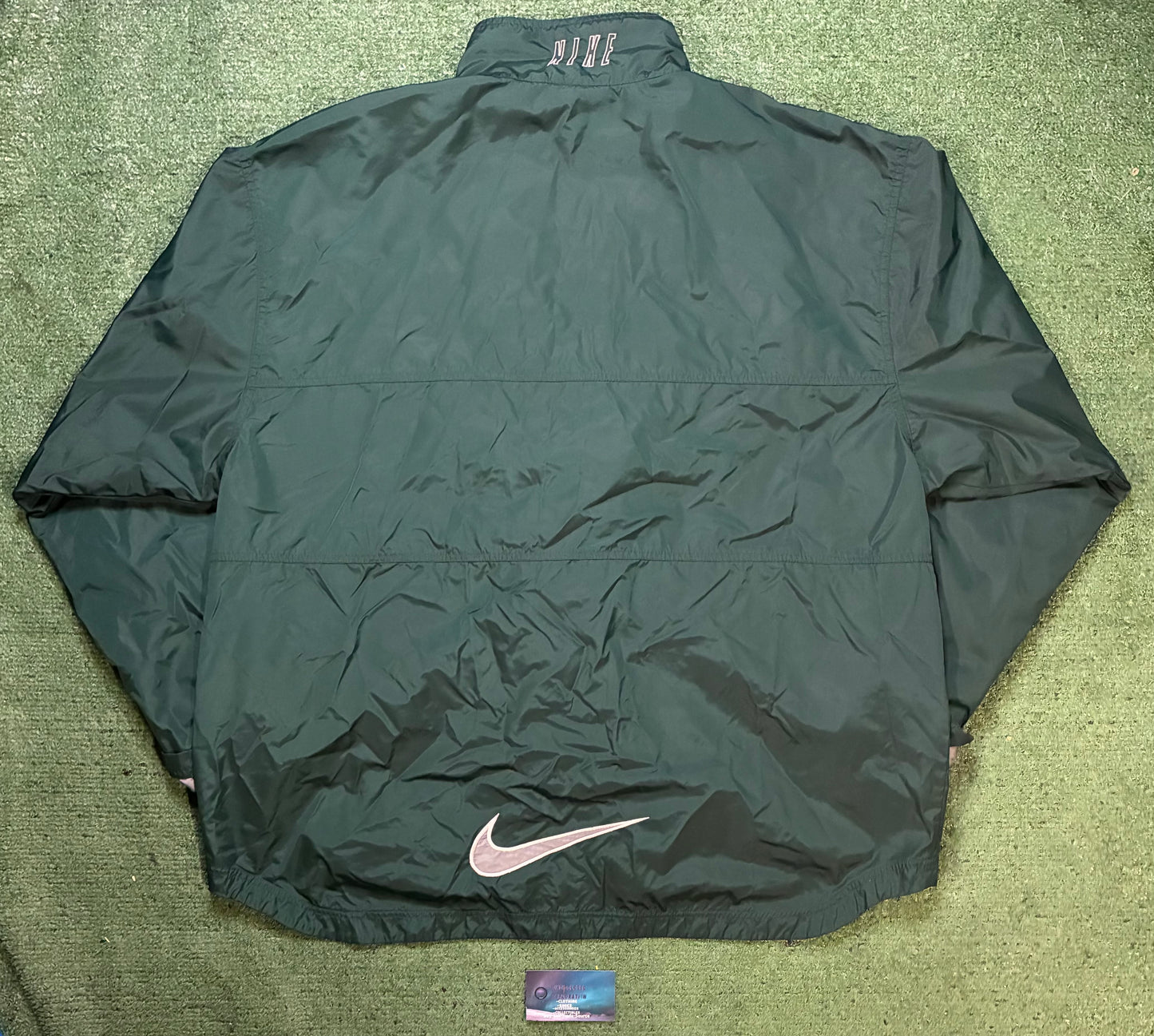 vintage 1990s forest green Nike full-zip windbreaker