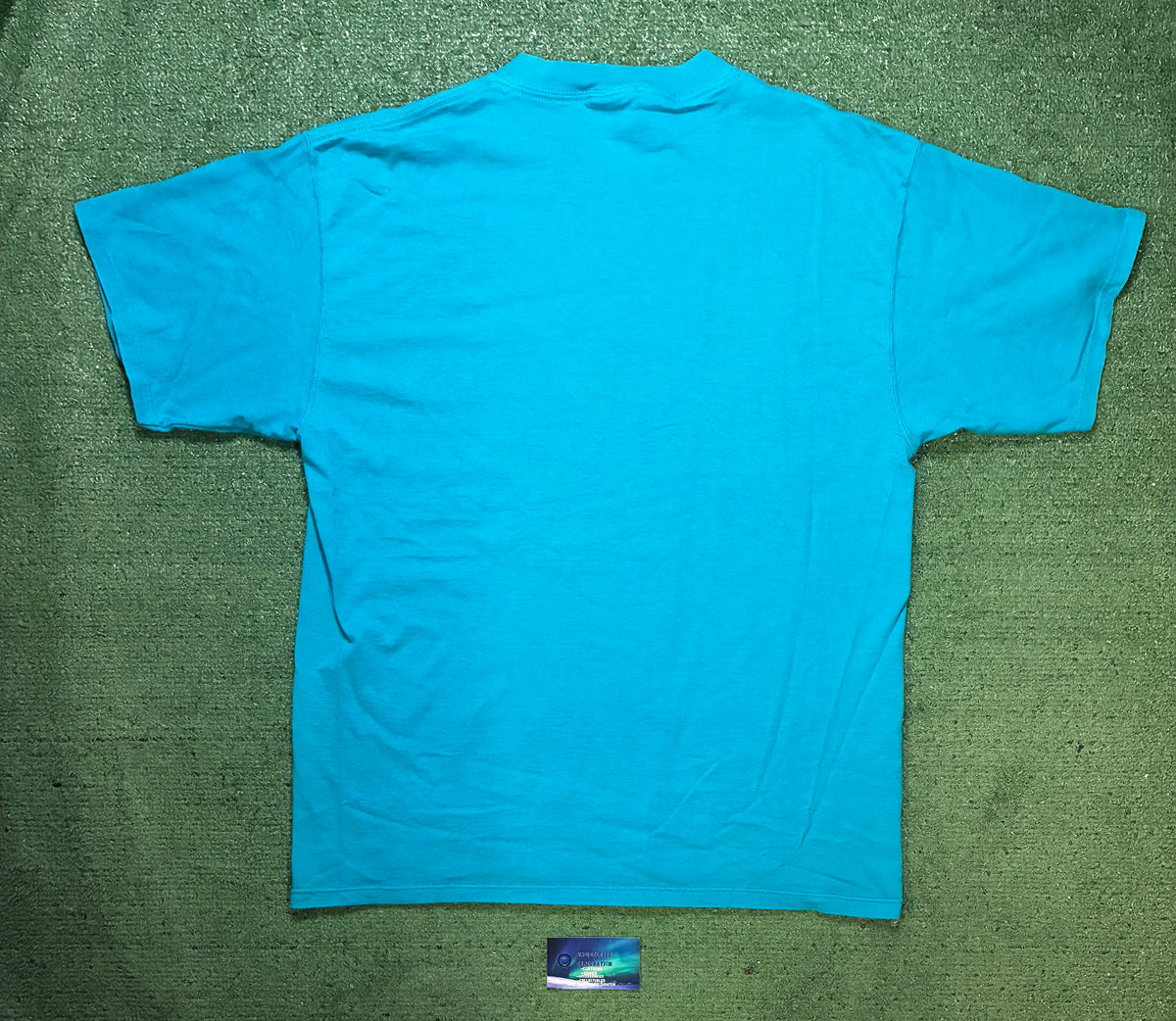 Vintage 1990s discuss athletics turquoise tee