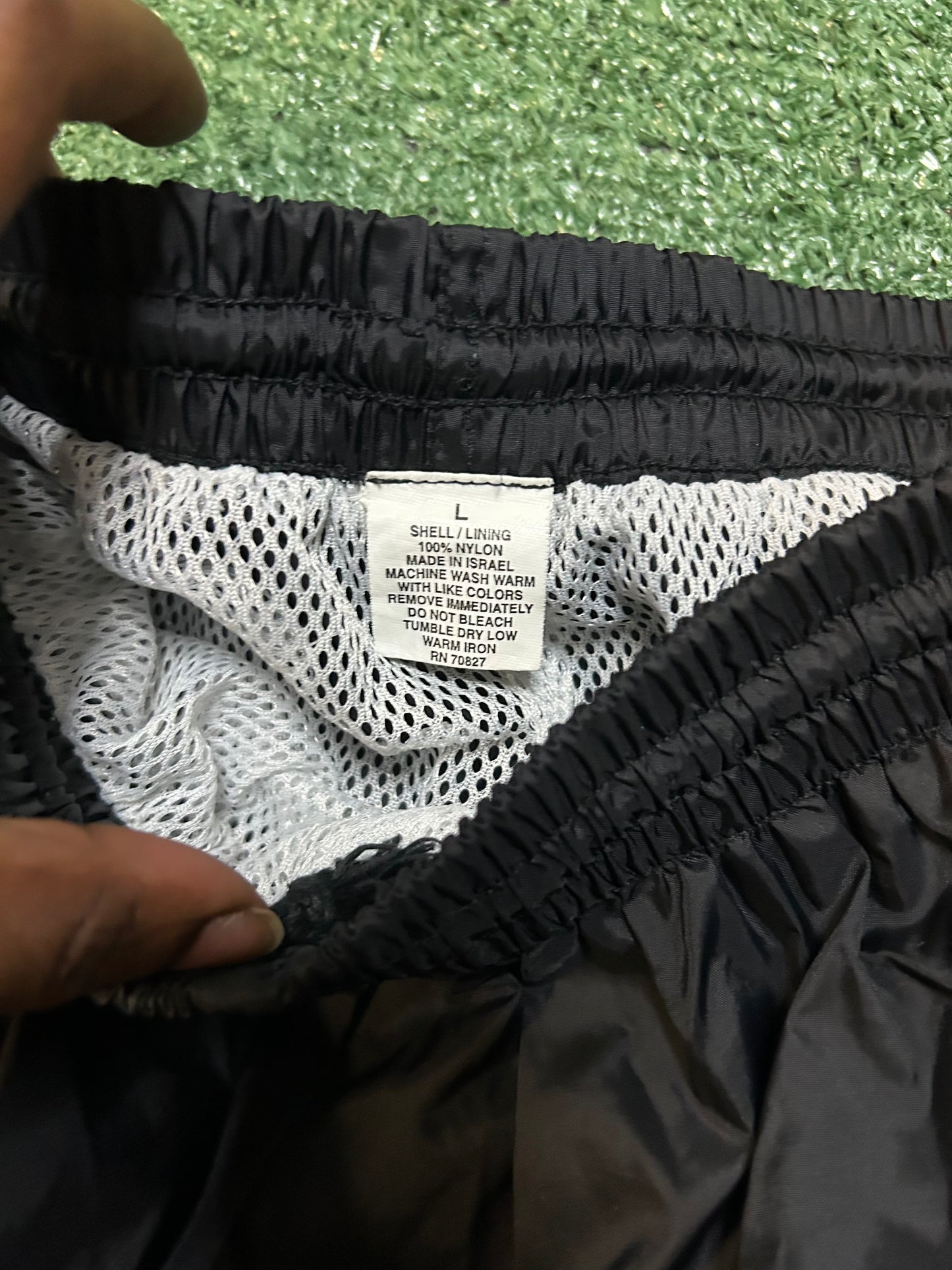 Black and white track pants