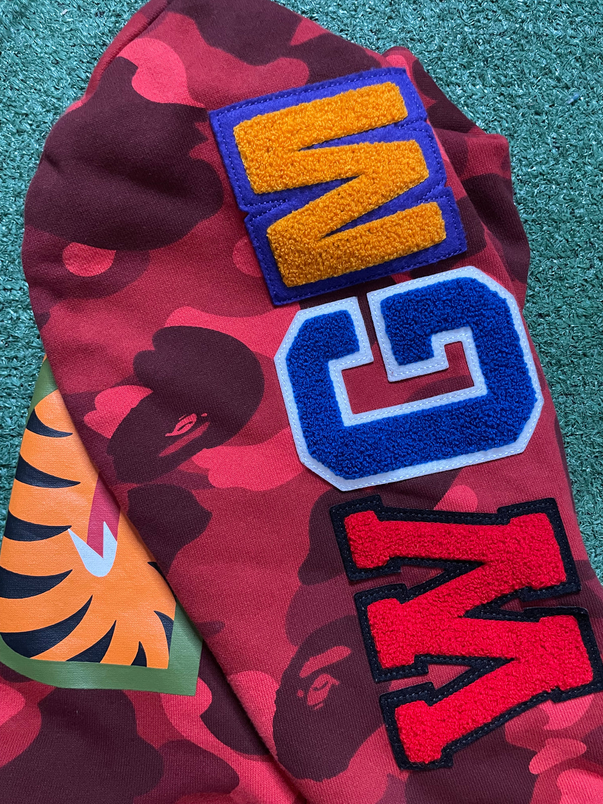 A Bathing Ape Bape red camo shark hoodie