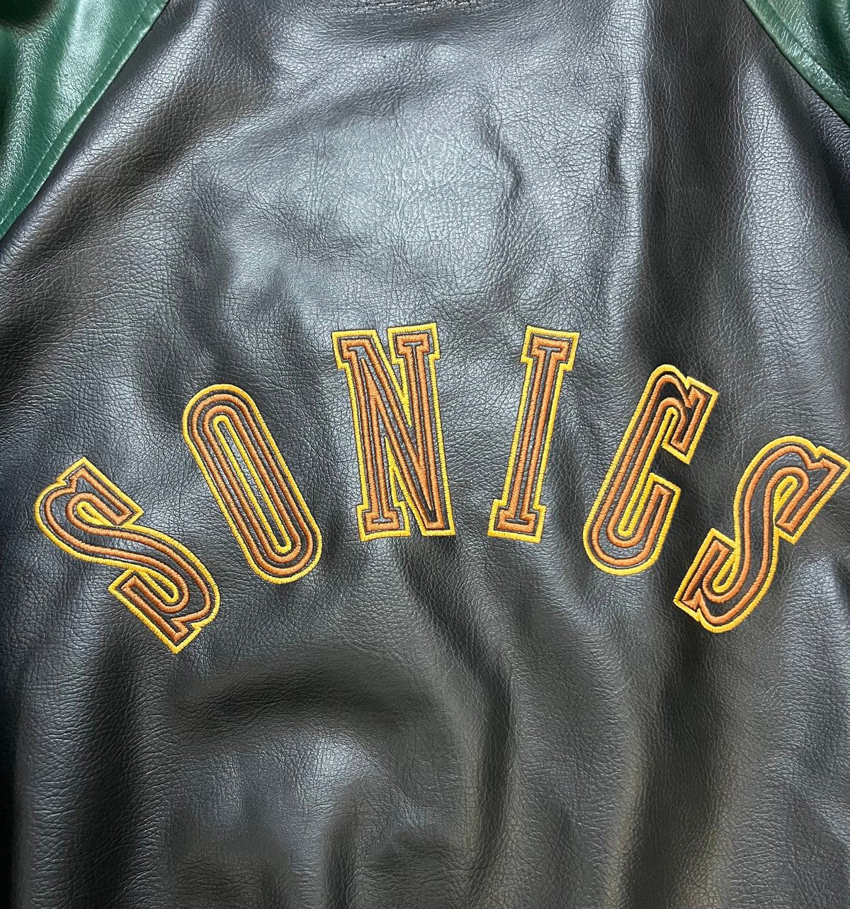 Vintage 1990s Seattle Sonics black & green suede & leather jacket